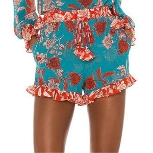 Misa Los Angeles Teal Floral Ruffle Shorts with Red Accents